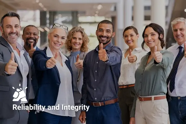 Group of diverse professionals giving thumbs up, promoting reliability and integrity in a modern office setting.